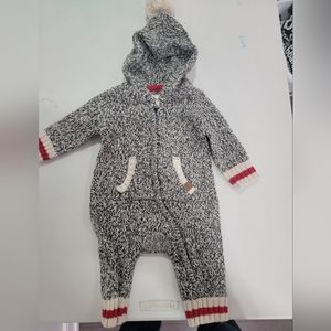 ROOTS onsie with pom pom